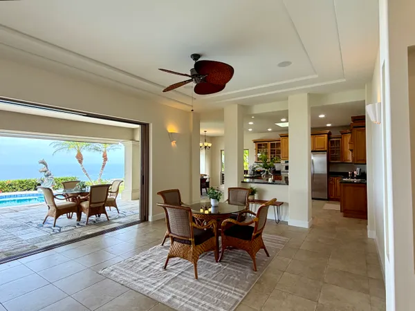 a view of a dining room with furniture window and outside view
