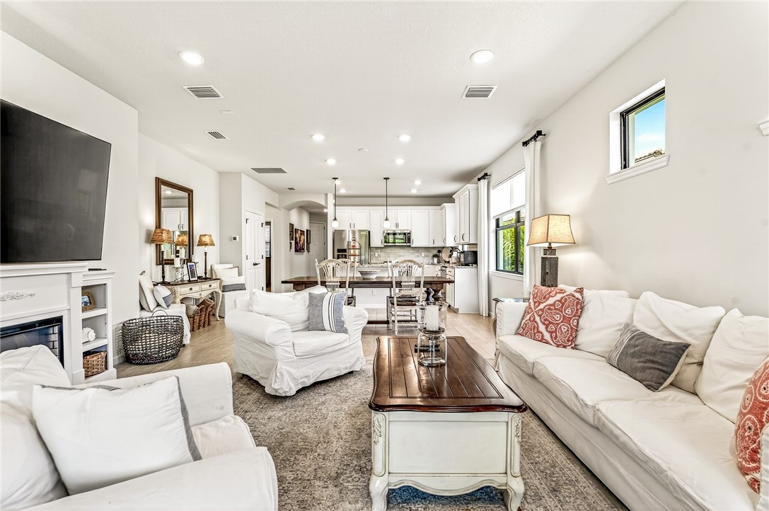 5191 Unity Square Vero Beach, FL 32967 - Photo 16 of 36 a living room with furniture and a flat screen tv