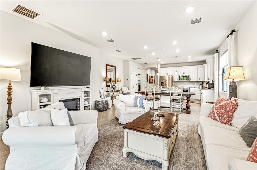 5191 Unity Square Vero Beach, FL 32967 - Photo 4 of 36 a living room with furniture and a flat screen tv