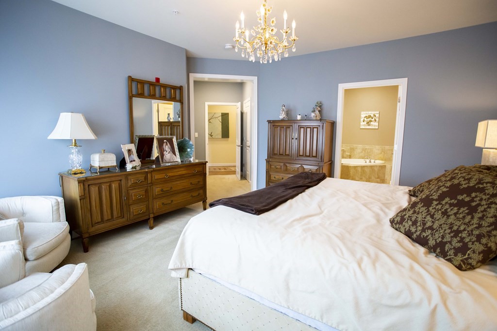 10 Abigail Way, Unit 3004 Reading, MA 01867 - Photo 12 of 32 a bedroom with bed and window