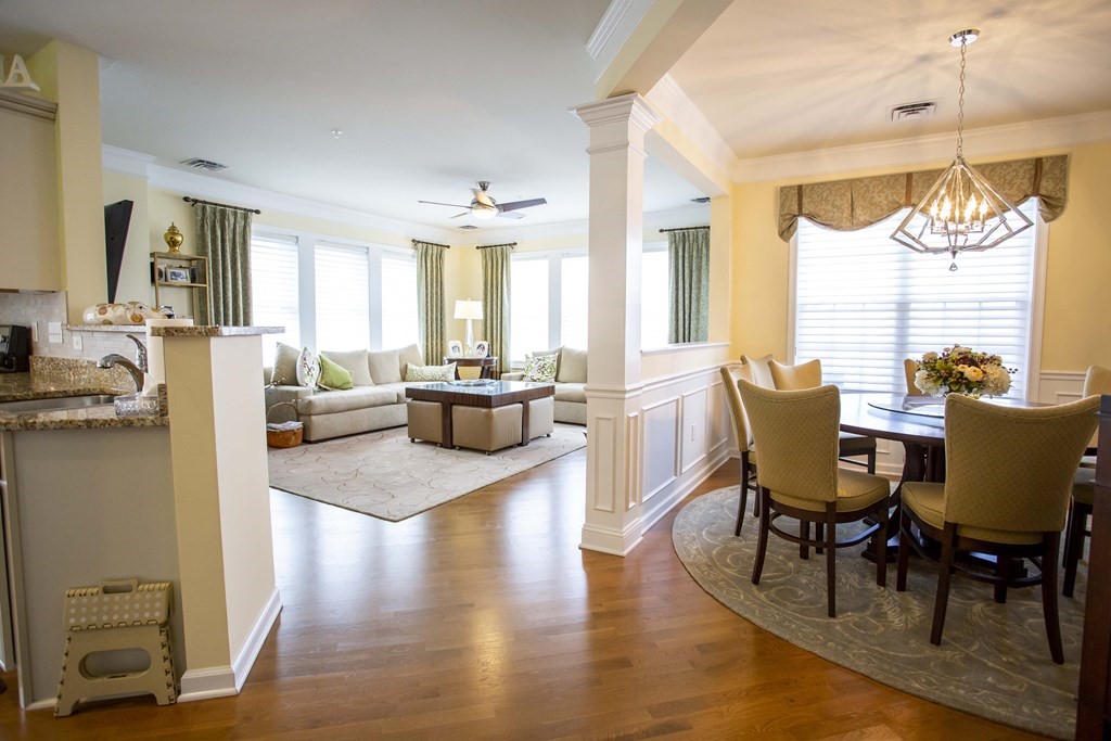 10 Abigail Way, Unit 3004 Reading, MA 01867 - Photo 15 of 32 a view of a dining room with furniture window and wooden floor
