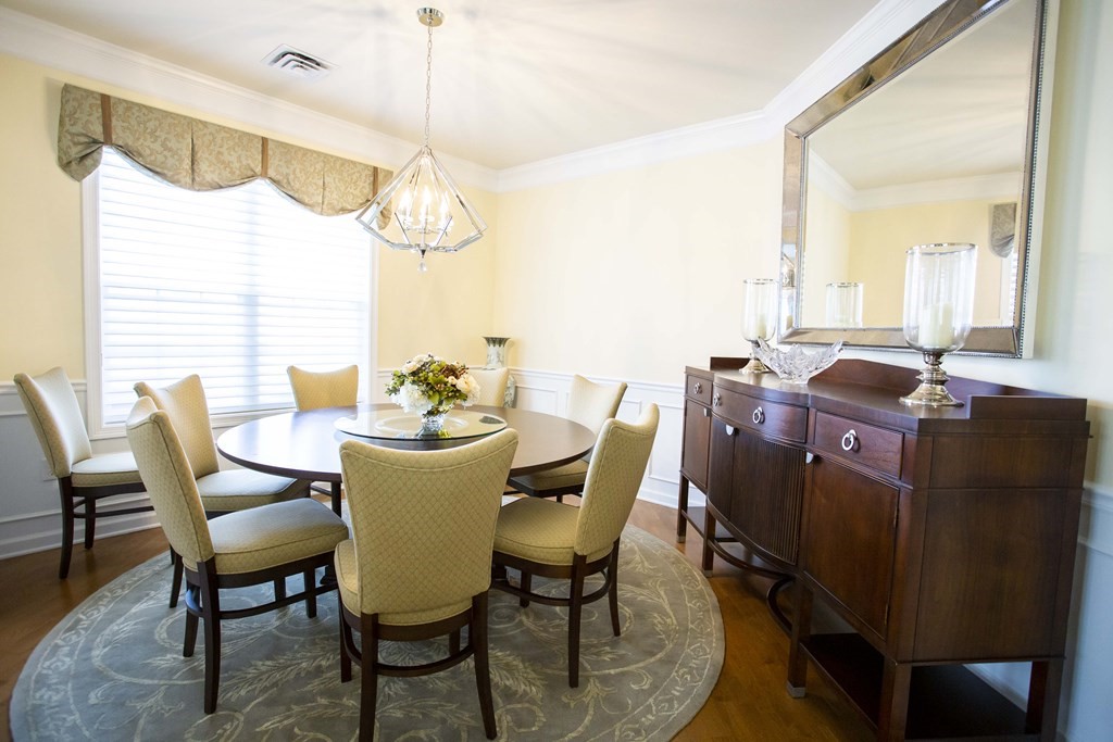 10 Abigail Way, Unit 3004 Reading, MA 01867 - Photo 20 of 32 a view of a dining room with furniture window and outside view