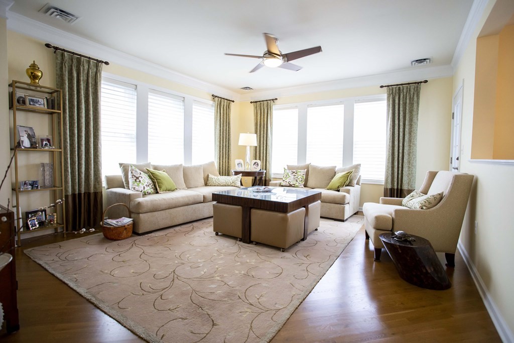 10 Abigail Way, Unit 3004 Reading, MA 01867 - Photo 21 of 32 a living room with furniture and a large window