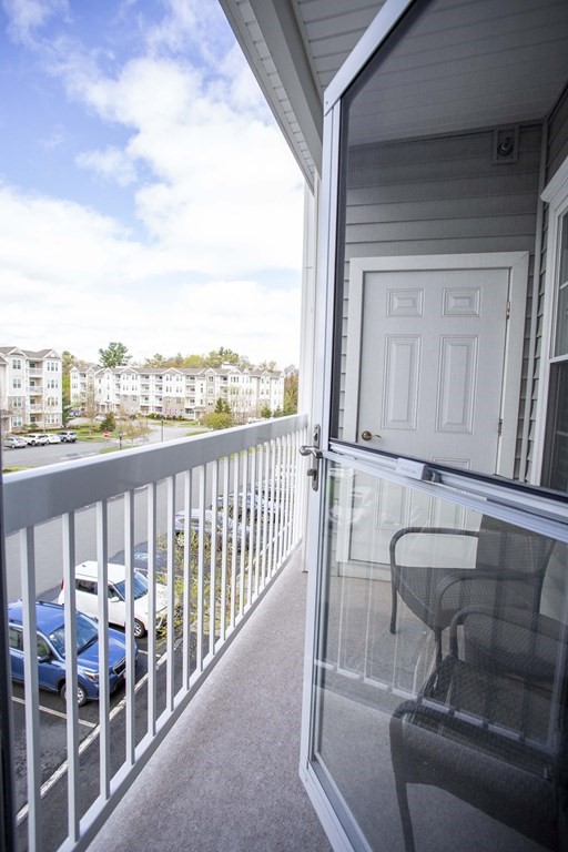 10 Abigail Way, Unit 3004 Reading, MA 01867 - Photo 25 of 32 a view of balcony with furniture