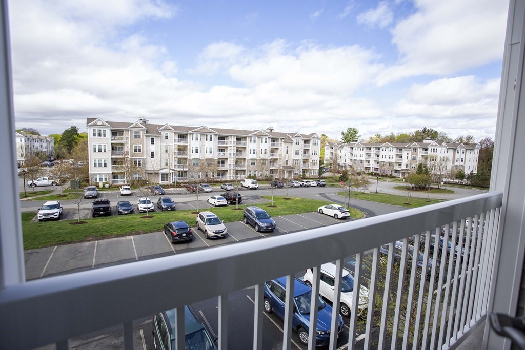 10 Abigail Way, Unit 3004 Reading, MA 01867 - Photo 26 of 32 a view of a city from a balcony