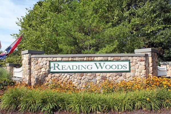 10 Abigail Way, Unit 3004 Reading, MA 01867 - Photo 29 of 32 a sign broad in front of the tree
