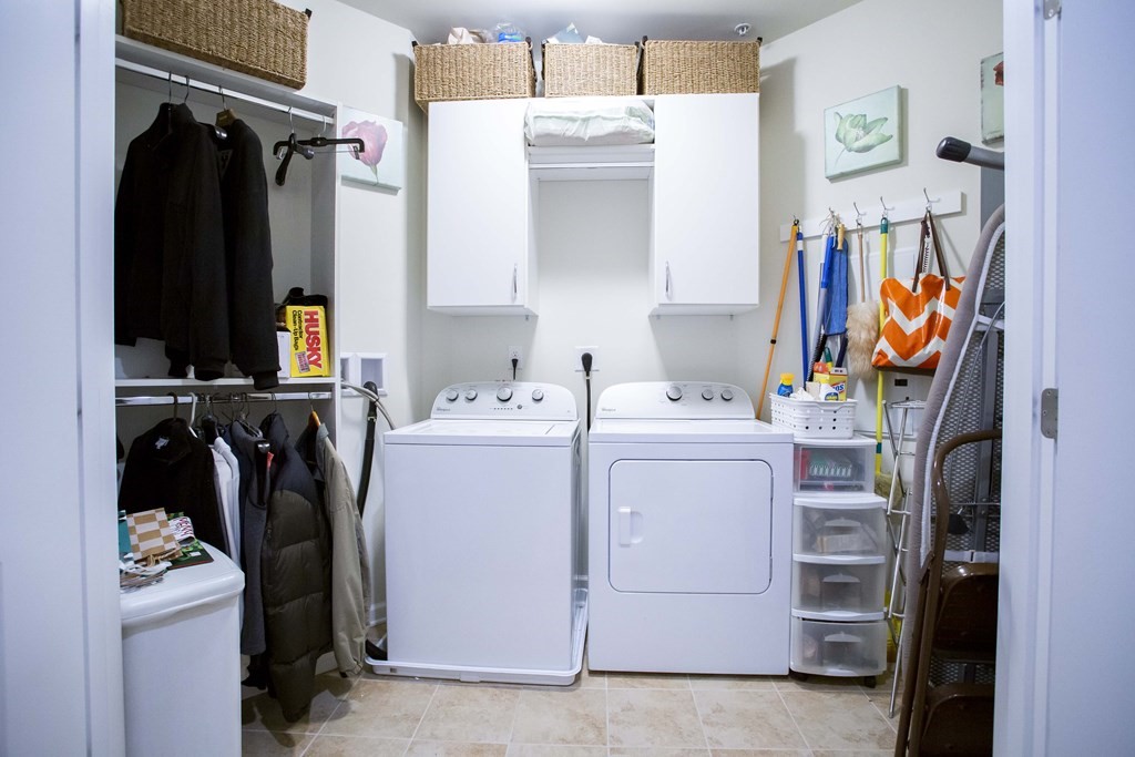 10 Abigail Way, Unit 3004 Reading, MA 01867 - Photo 4 of 32 a view of walk in closet with clothes and shoes
