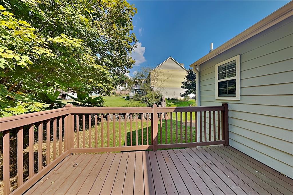 1049 Braddock Circle Woodstock, GA 30189 - Photo 17 of 20 a view of wooden deck