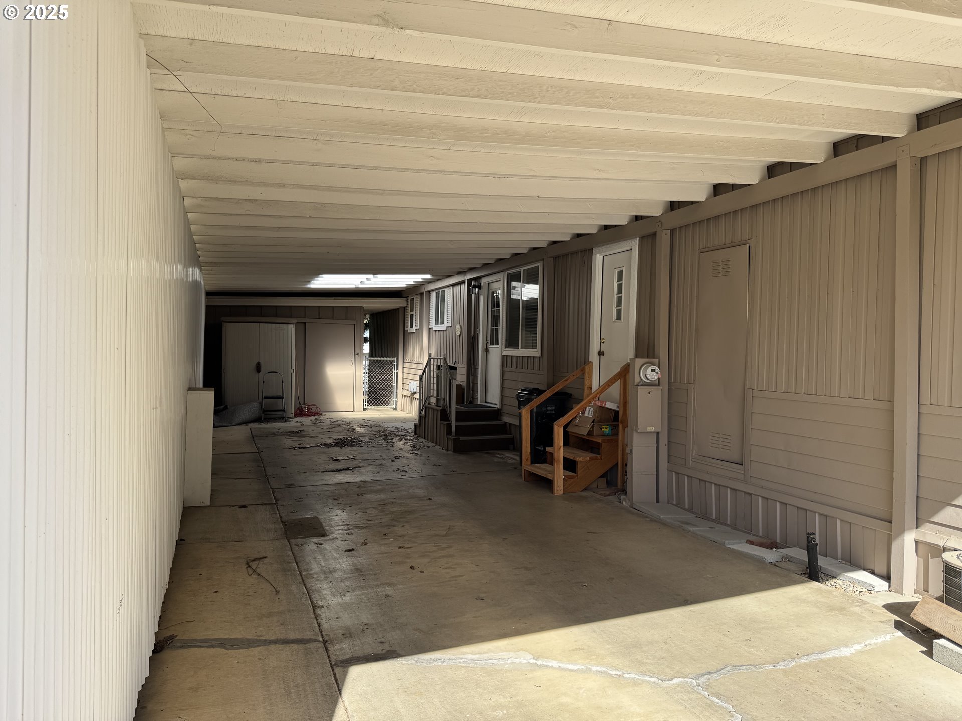 3955 South Stage Road, Unit 6 Medford, OR 97501 - Photo 20 of 21 a view of a hallway with seating area