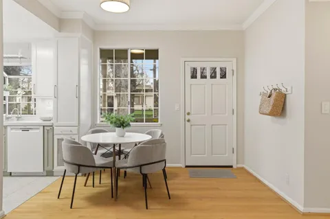 a view of a livingroom with furniture and wooden floor