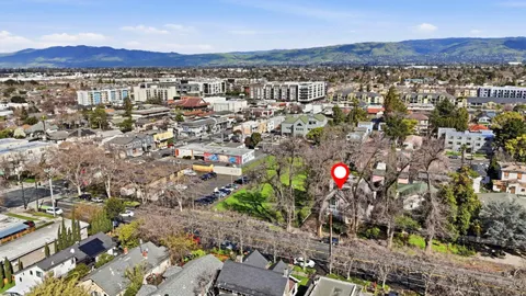 an aerial view of residential building and trees