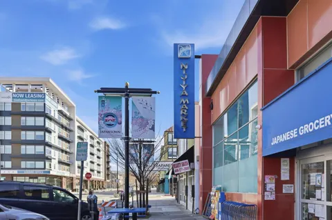 a front view of a building with street view