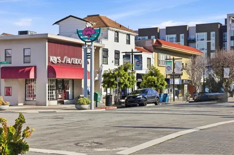 a view of a building with a street