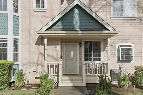 a front view of a house with glass windows