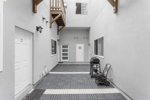 a view of a entryway with wooden floor