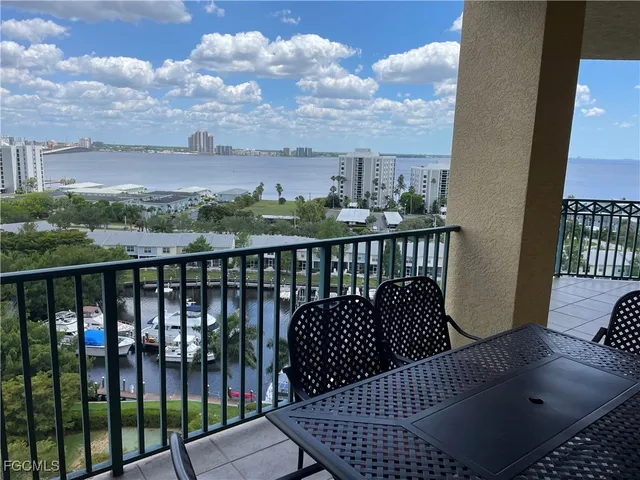 a view of a balcony with wooden floor