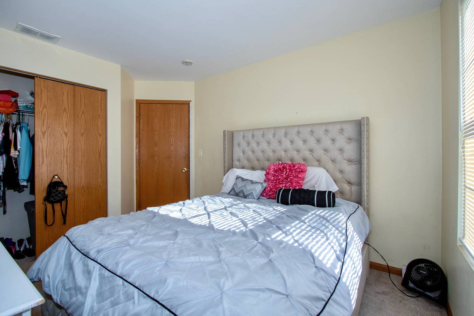 175 Springbrook Trail South Oswego, IL 60543 - Photo 17 of 25 a bedroom with a bed and a lamp