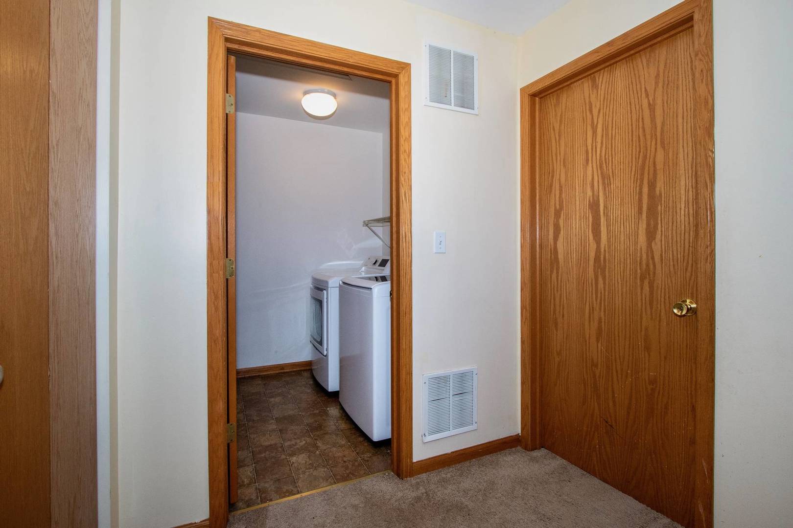 175 Springbrook Trail South Oswego, IL 60543 - Photo 21 of 25 a view of a bathroom with a door