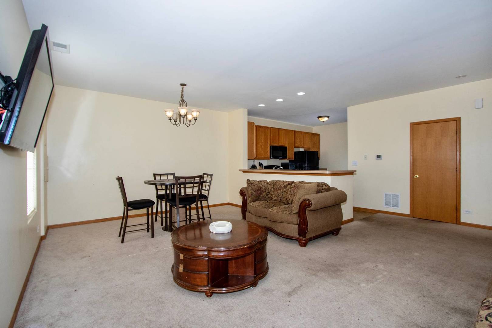 175 Springbrook Trail South Oswego, IL 60543 - Photo 7 of 25 a living room with furniture and wooden floor