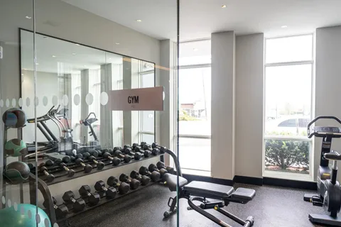 a view of a room with gym equipment