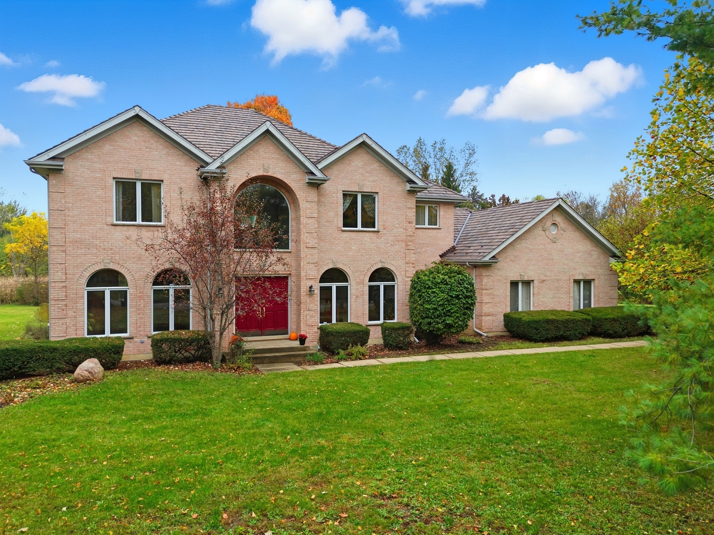 4420 Stonehaven Drive Long Grove, IL 60047 - Photo 1 of 59 a front view of house with yard and green space