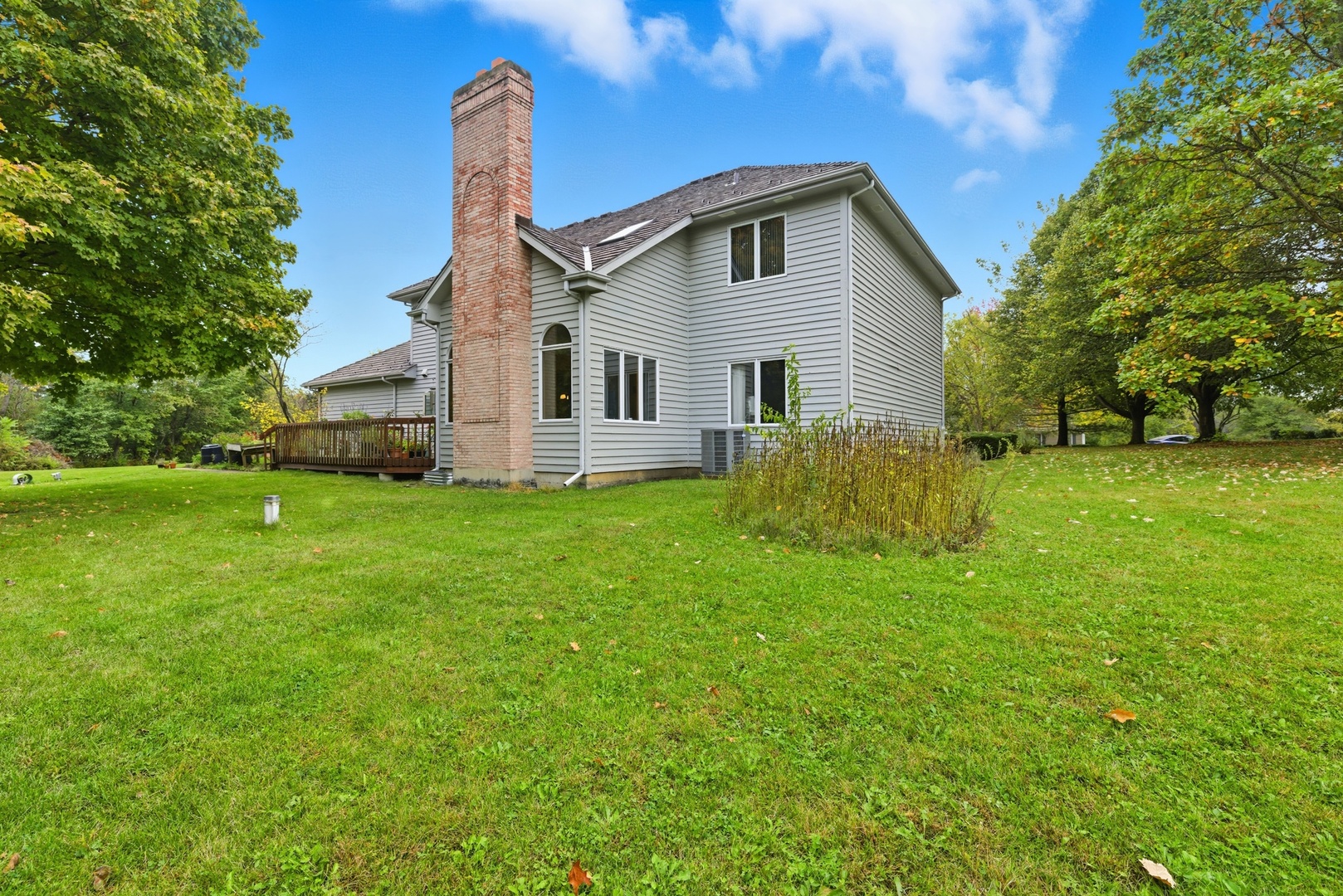4420 Stonehaven Drive Long Grove, IL 60047 - Photo 49 of 59 a front view of a house with garden