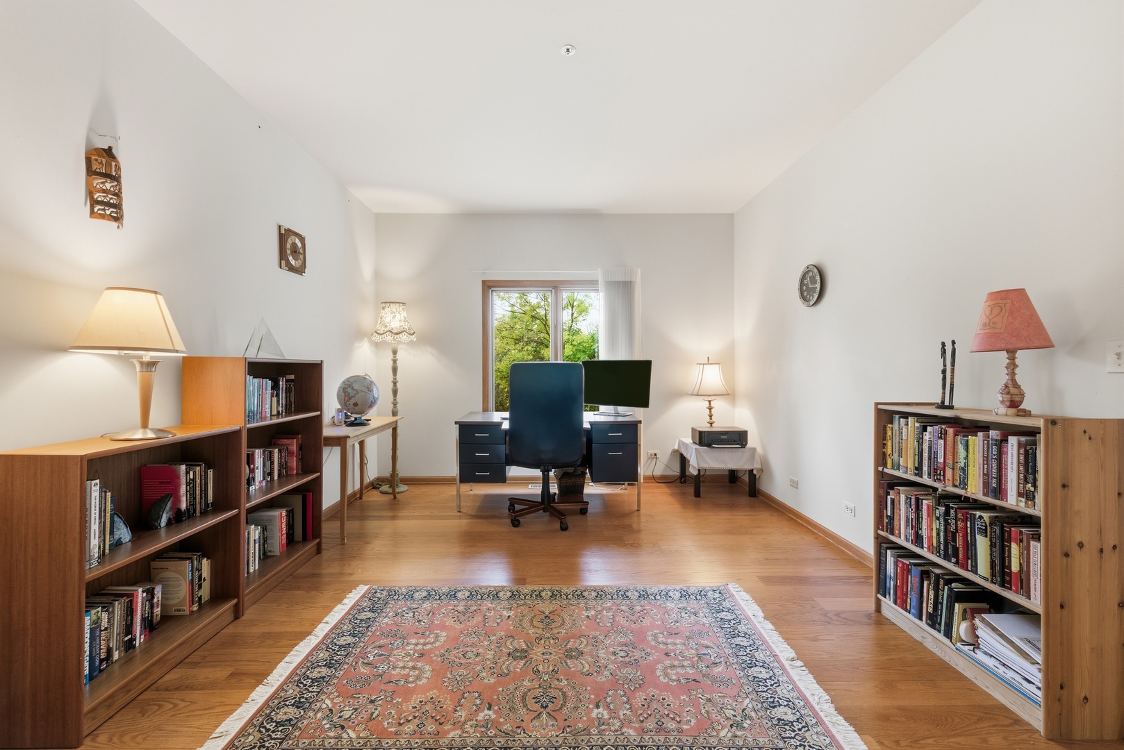 4420 Stonehaven Drive Long Grove, IL 60047 - Photo 7 of 59 a living room with furniture and a book shelf