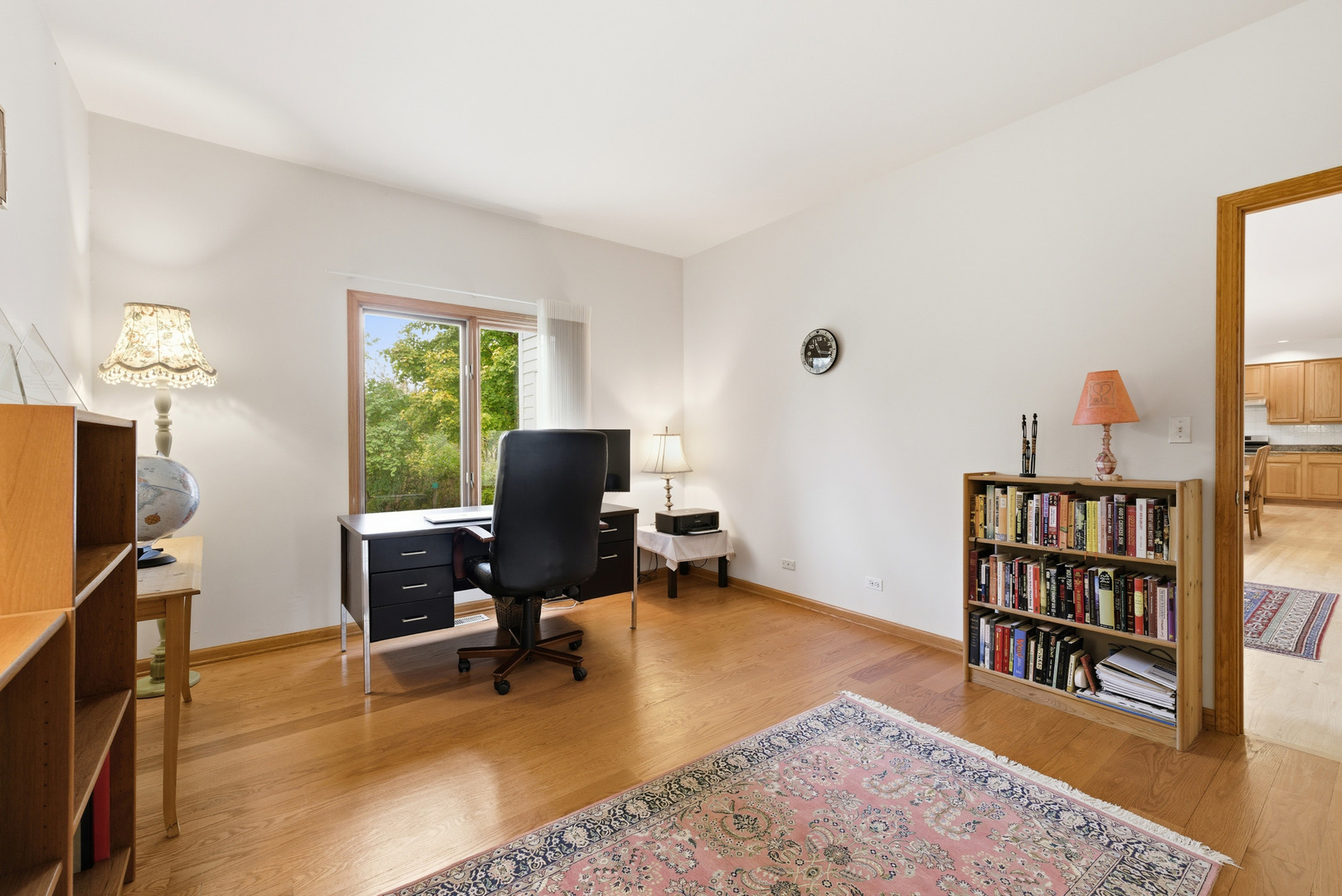 4420 Stonehaven Drive Long Grove, IL 60047 - Photo 8 of 59 a view of a workspace with furniture and a window
