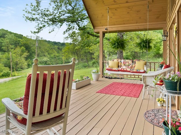 631 Short Brook Road Vincent, OH 45784 - Photo 4 of 31 Wooden deck with a wooded view and a lawn