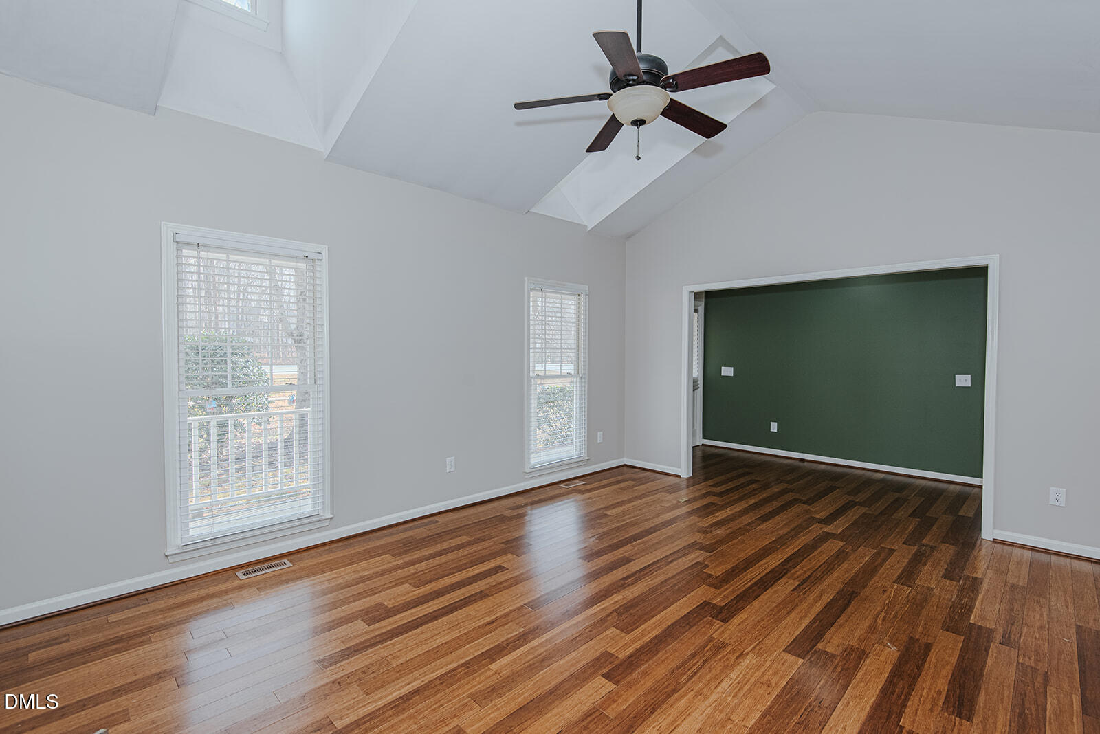 802 South Third Street Mebane, NC 27302 - Photo 16 of 41 a view of empty room with wooden floor and fan