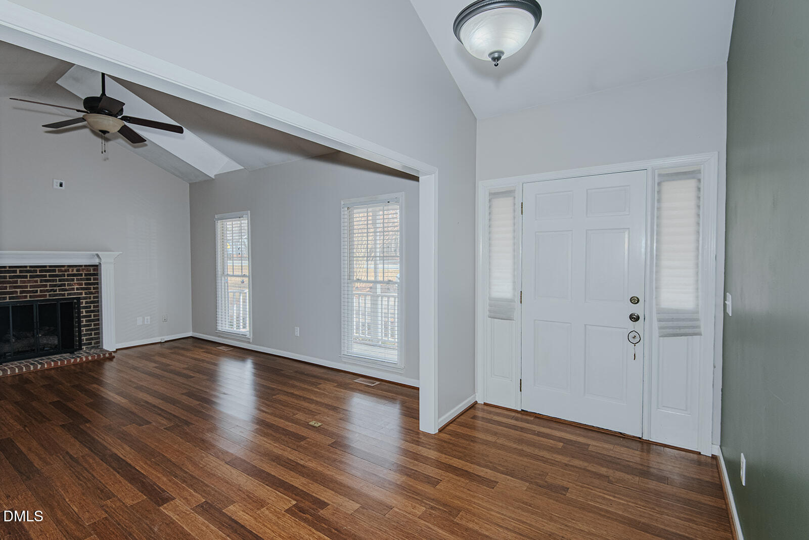 802 South Third Street Mebane, NC 27302 - Photo 17 of 41 a view of empty room with wooden floor and fan
