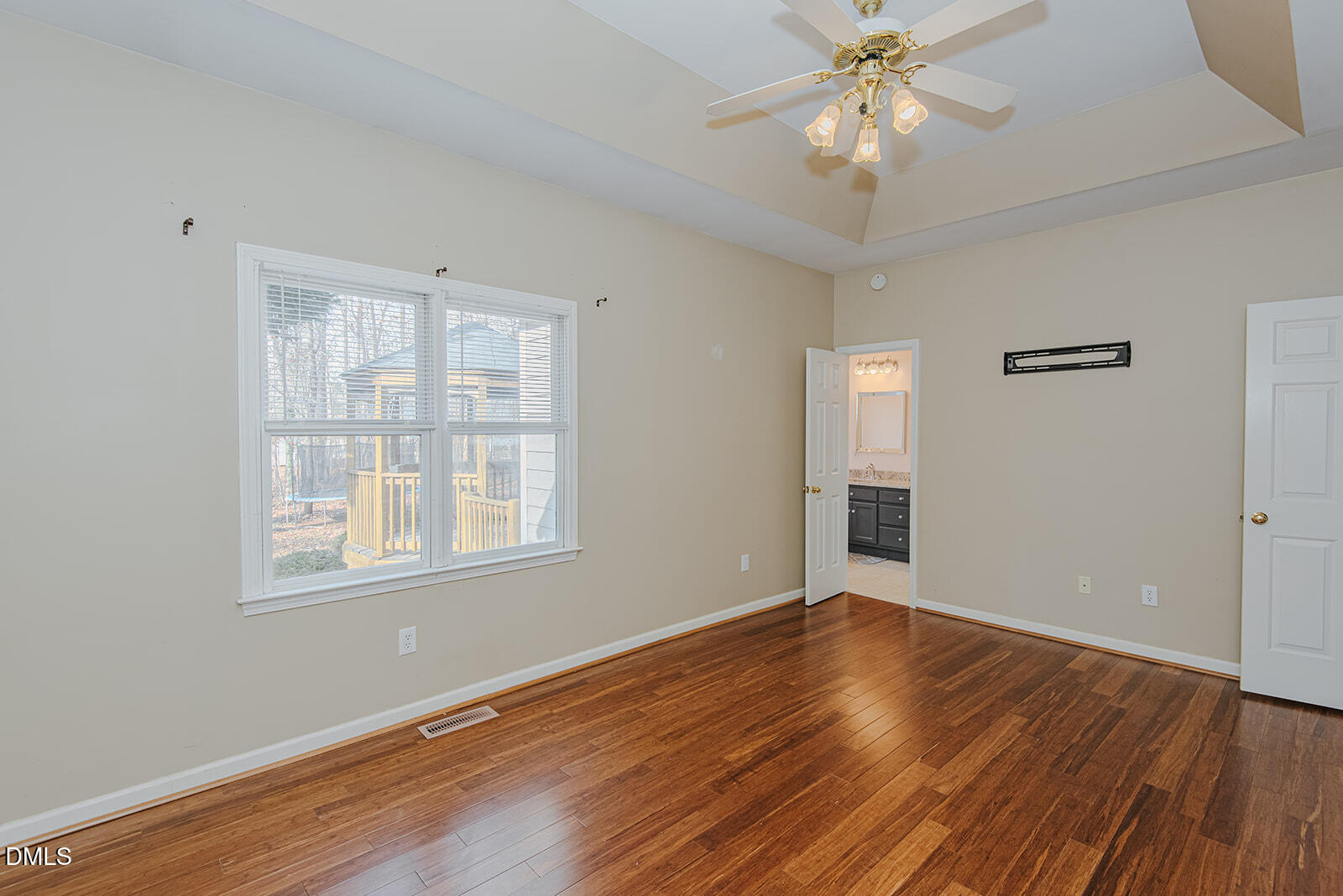 802 South Third Street Mebane, NC 27302 - Photo 20 of 41 a view of an empty room with wooden floor and a window