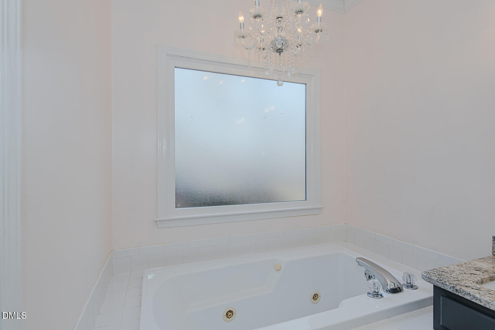 802 South Third Street Mebane, NC 27302 - Photo 22 of 41 a white bath tub sitting in a bathroom