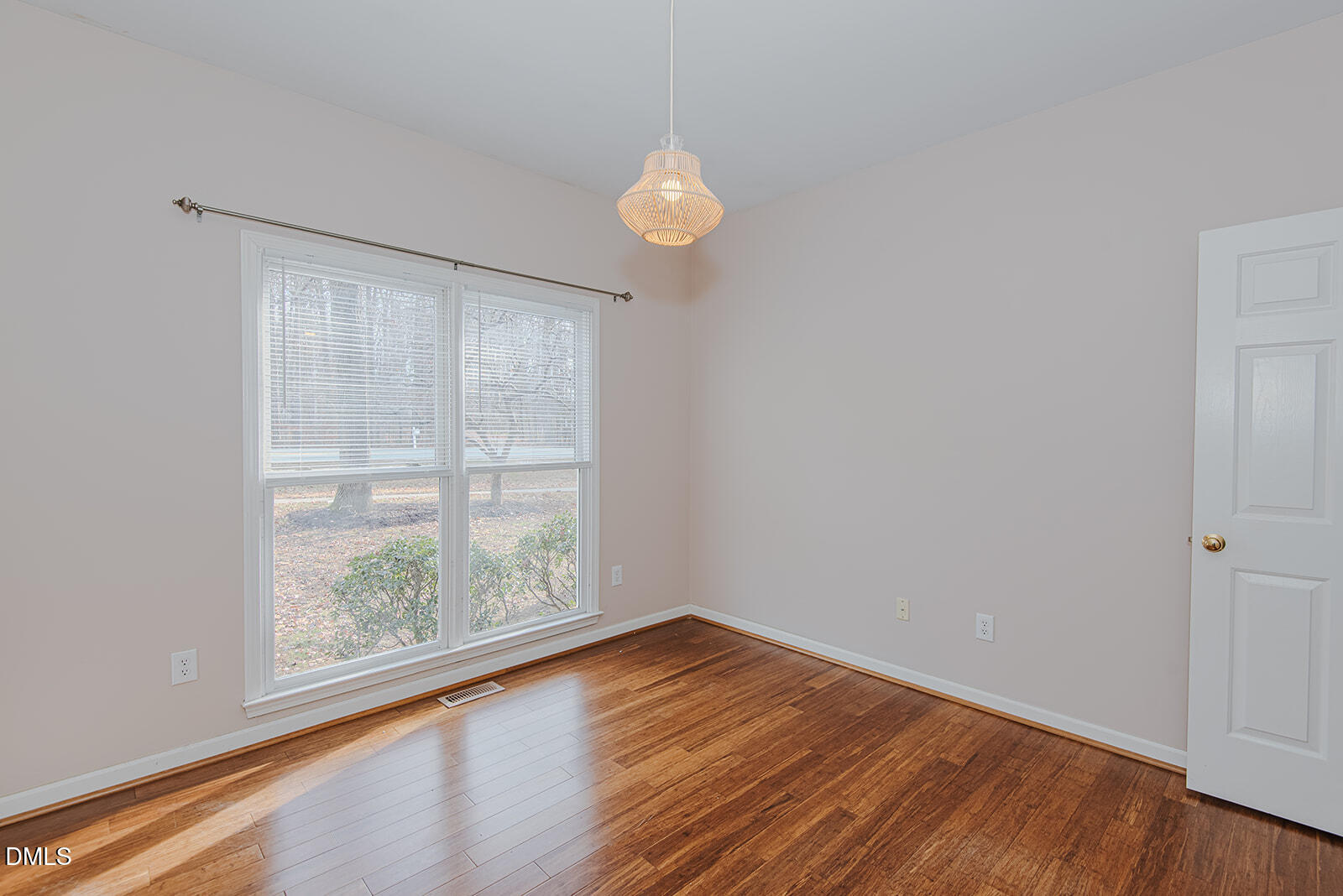 802 South Third Street Mebane, NC 27302 - Photo 24 of 41 wooden floor in an empty room with a window