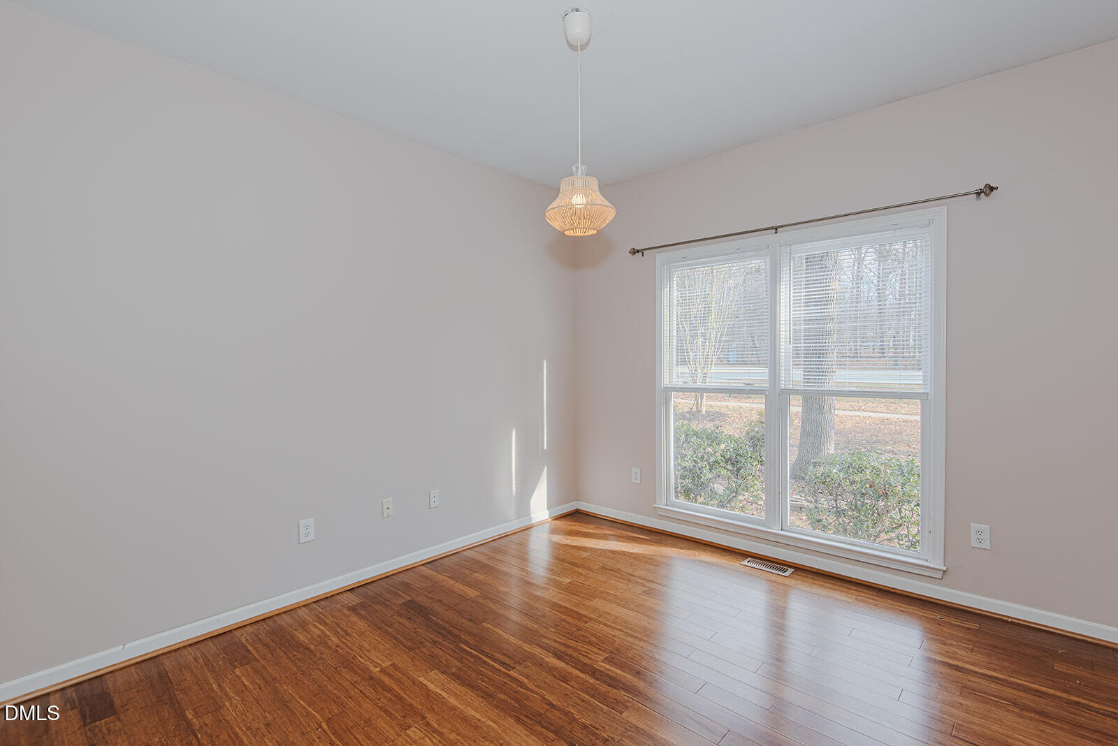 802 South Third Street Mebane, NC 27302 - Photo 26 of 41 wooden floor in an empty room with a window