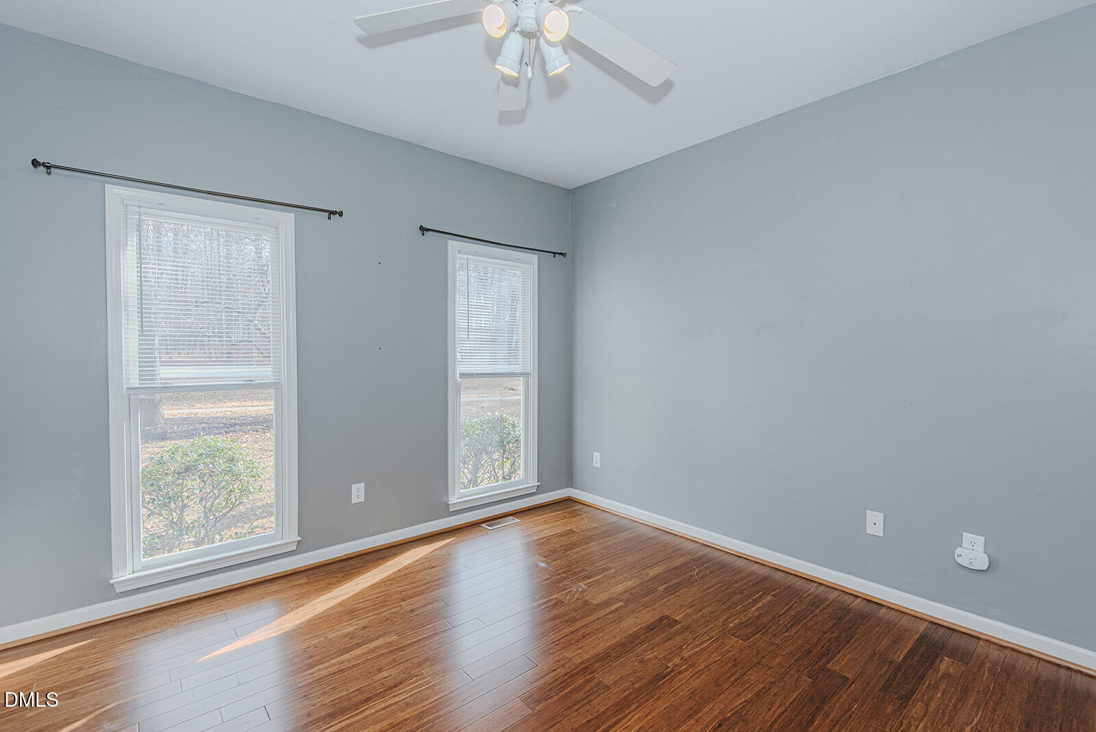 802 South Third Street Mebane, NC 27302 - Photo 29 of 41 wooden floor in an empty room with a window