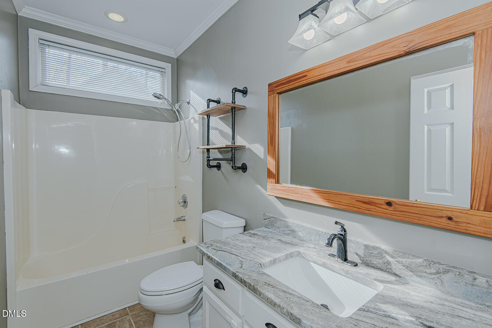 802 South Third Street Mebane, NC 27302 - Photo 30 of 41 a bathroom with a sink a toilet and shower