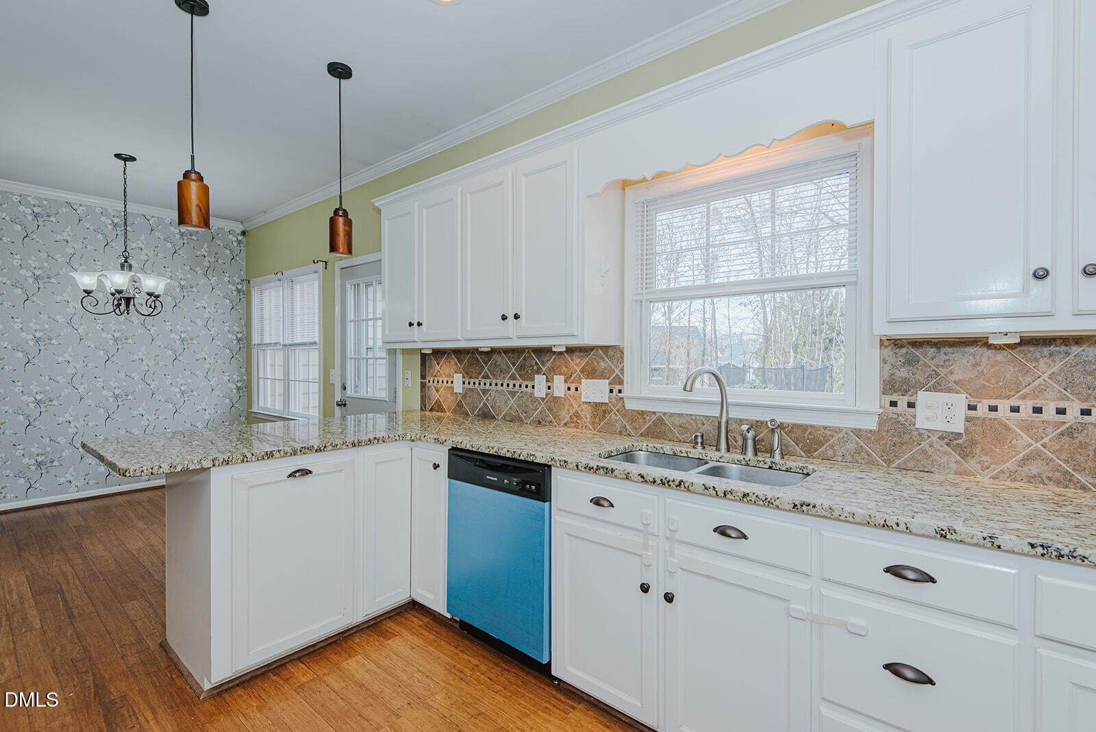 802 South Third Street Mebane, NC 27302 - Photo 3 of 41 a kitchen with appliances cabinets and a sink