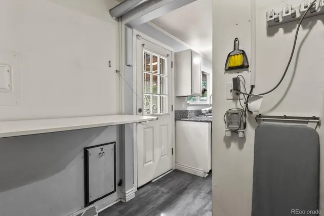 a view of entryway with wooden floor