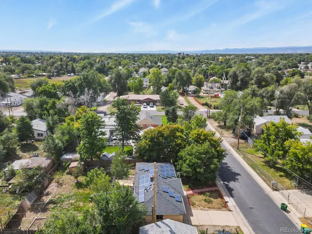 an aerial view of a city with lots of residential buildings