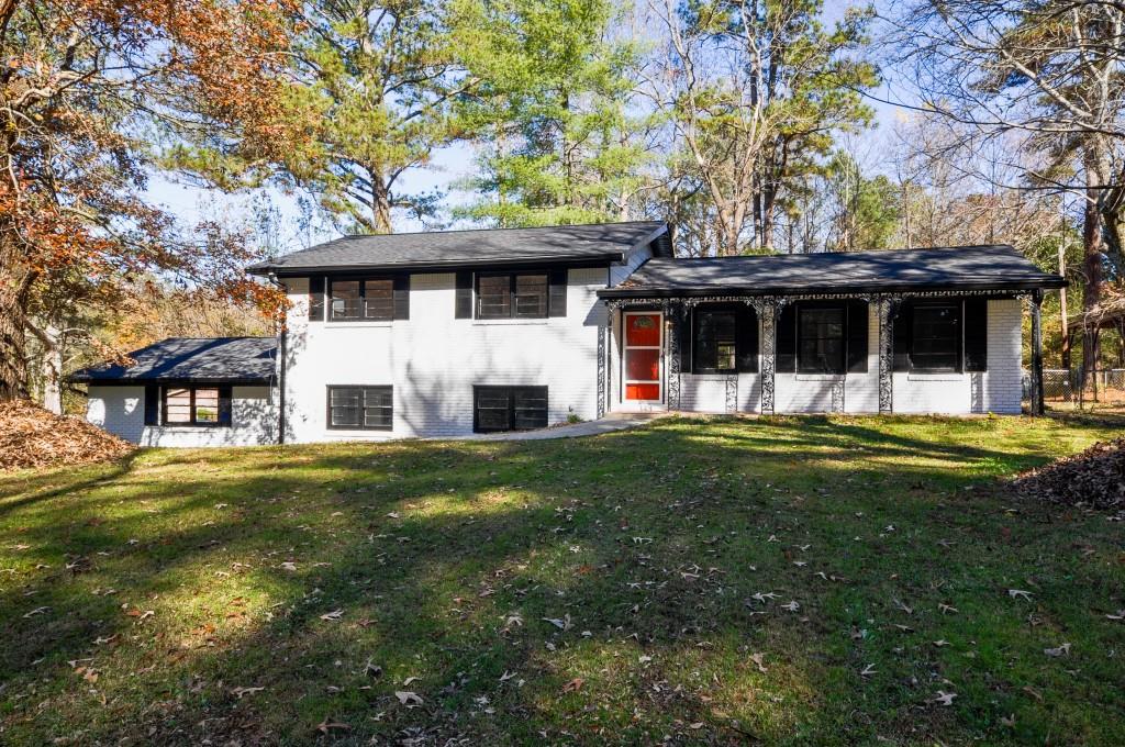 237 Rivertown Road Fairburn, GA 30213 - Photo 1 of 1 a front view of a house with swimming pool