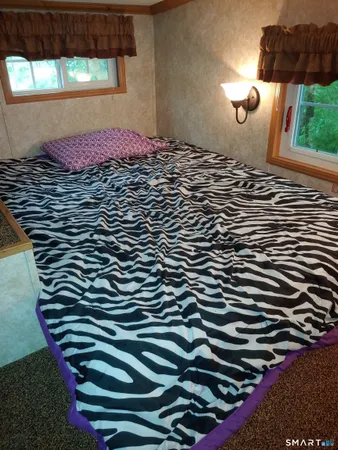 a view of a room with windows