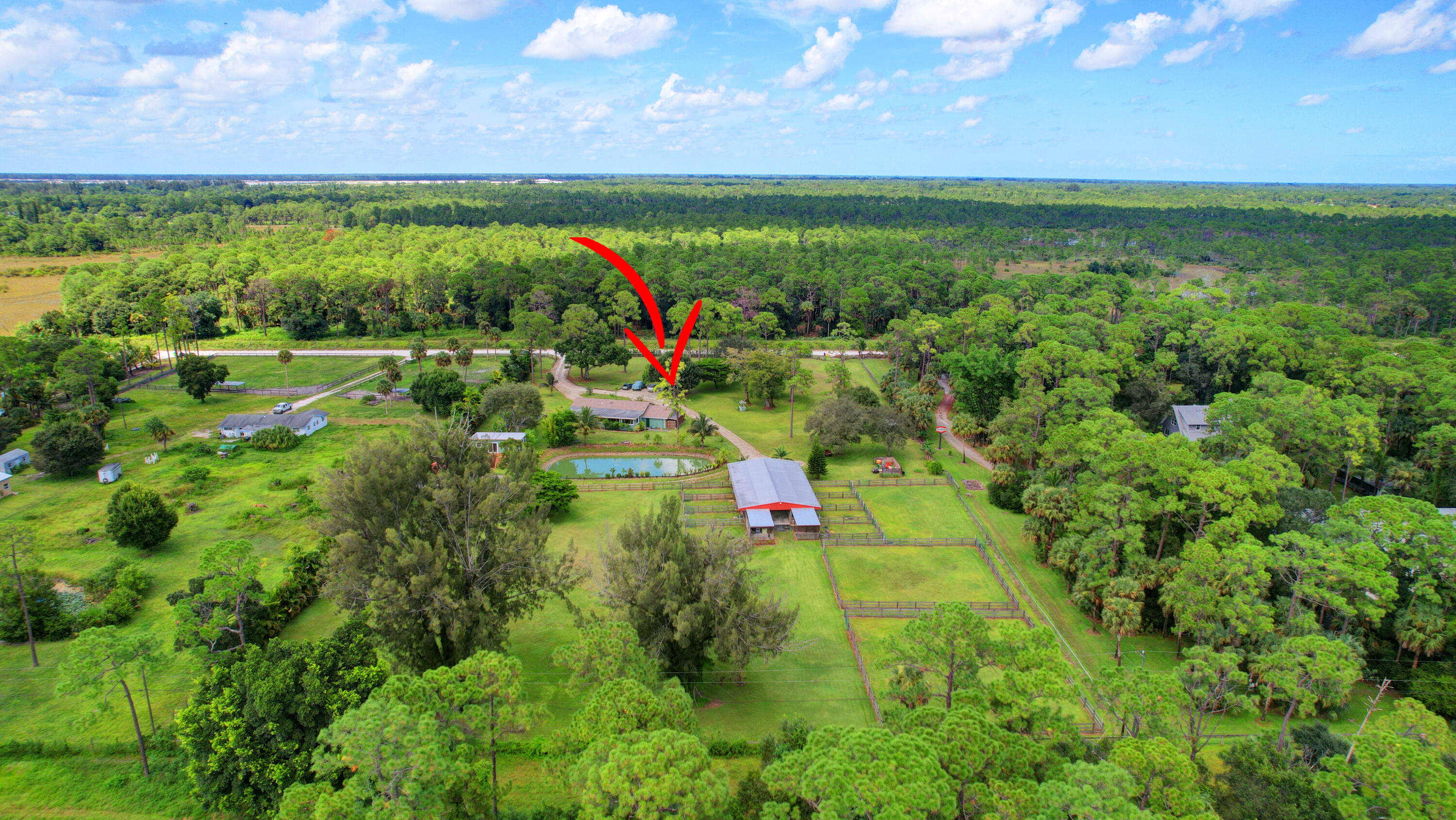 13598 N Road Loxahatchee Groves, FL 33470 - Photo 12 of 87 12_house air (12)