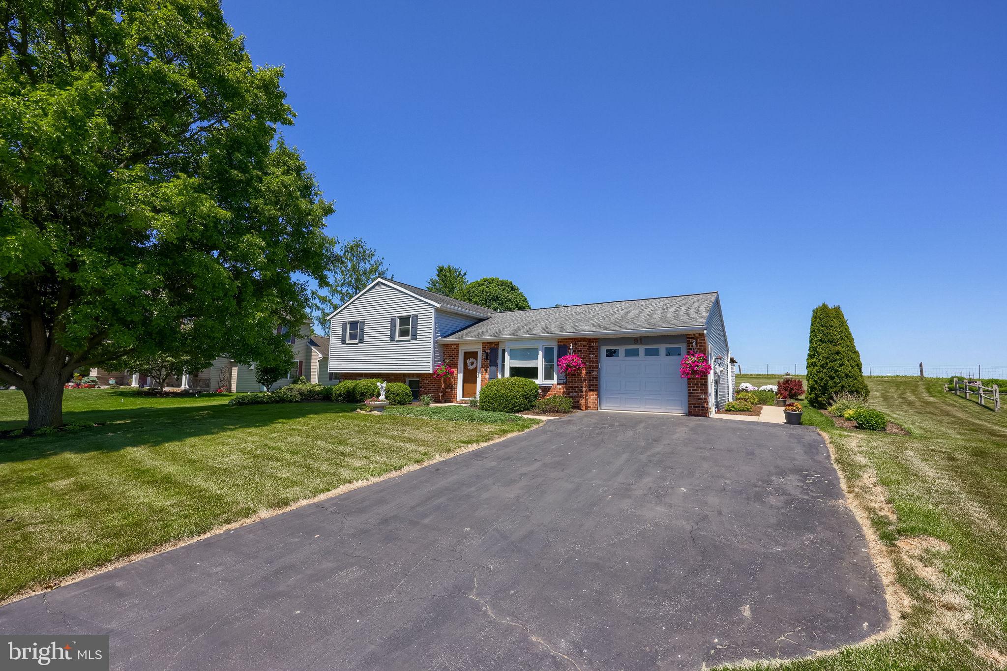 91 Buchland Road Ephrata, PA 17522 - Photo 44 of 59 Charming home with lush greenery.