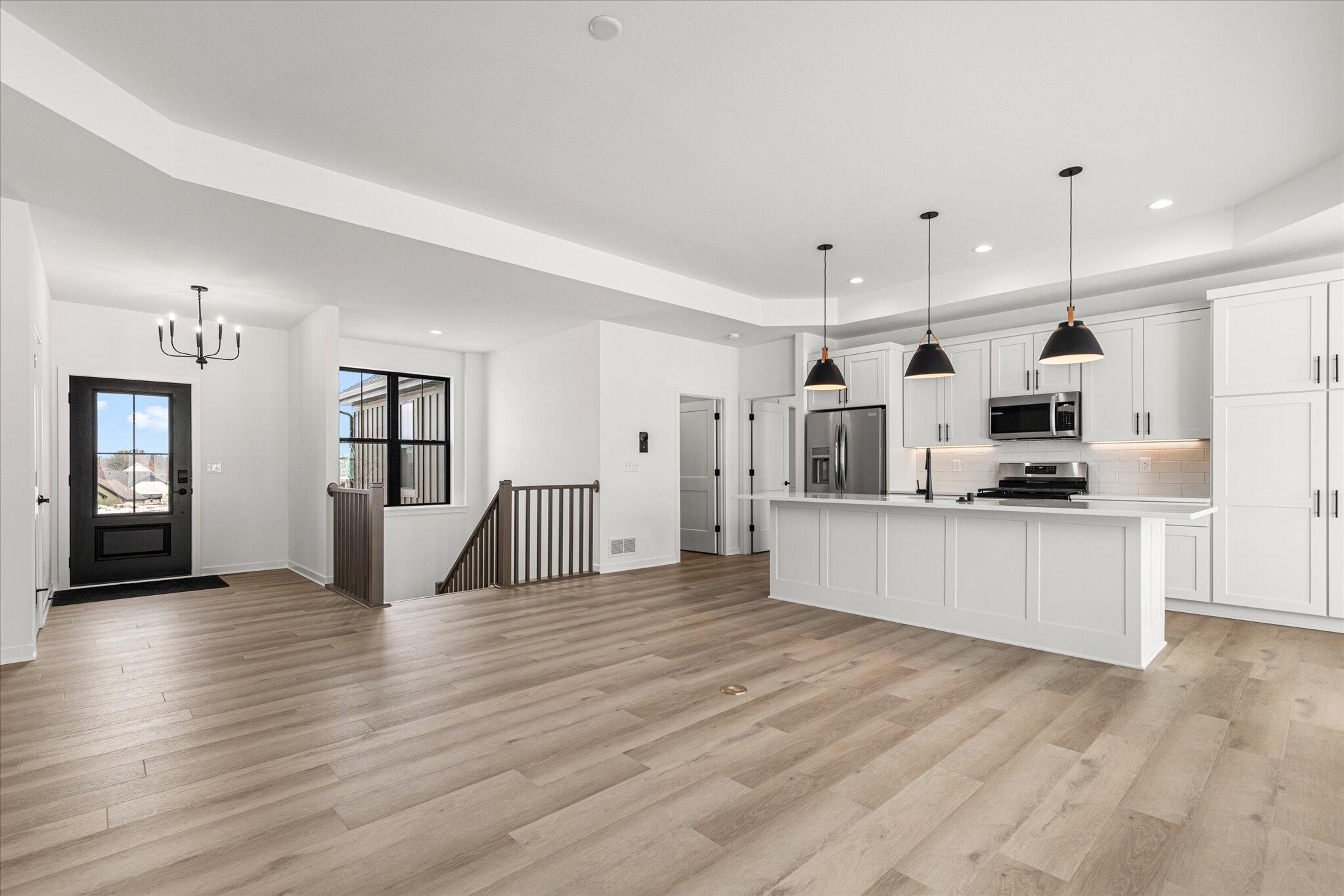 W209-n5699 Turnberry Lane, Unit LT103 Menomonee Falls, WI 53051 - Photo 13 of 31 w209n5699-turnberry-lane-12-living-room-