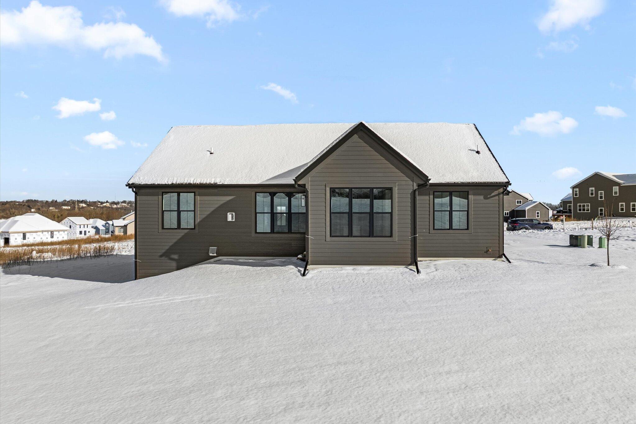 W209-n5699 Turnberry Lane, Unit LT103 Menomonee Falls, WI 53051 - Photo 29 of 31 w209n5699-turnberry-lane-28-rear-of-home