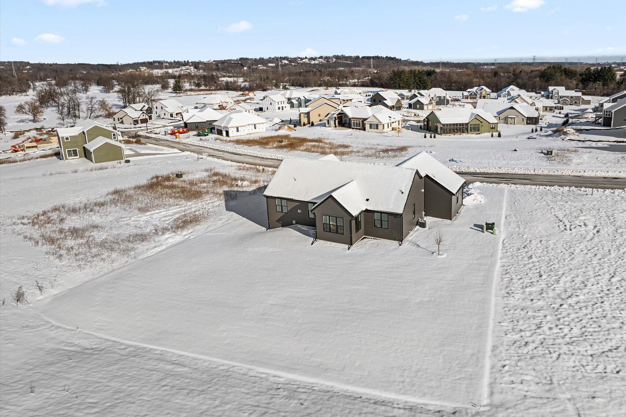 W209-n5699 Turnberry Lane, Unit LT103 Menomonee Falls, WI 53051 - Photo 30 of 31 w209n5699-turnberry-lane-29-back-of-lot