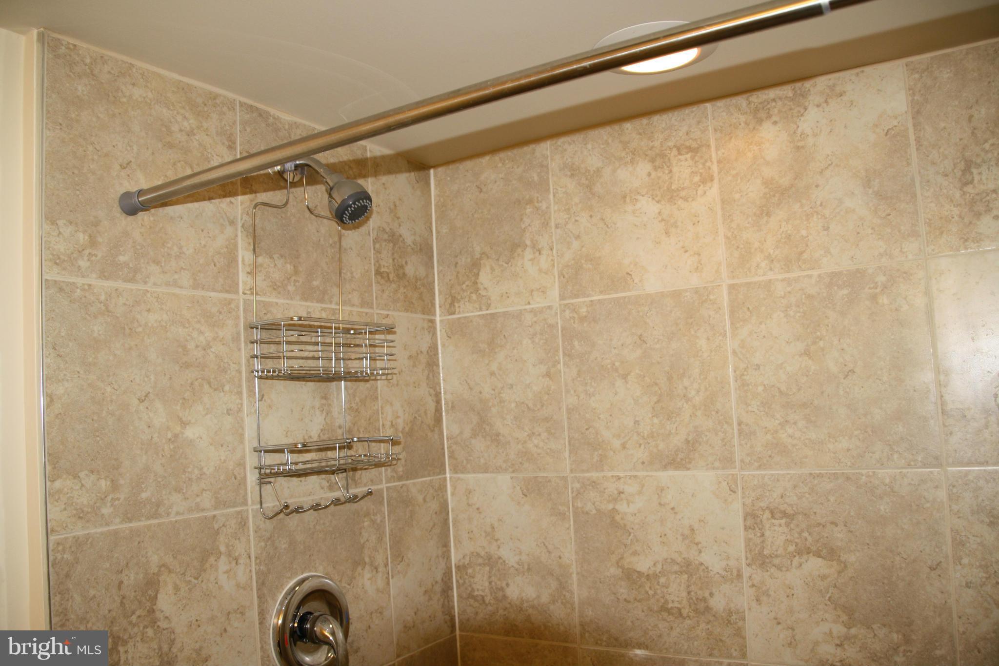 11509 Bucknell Drive Silver Spring, MD 20902 - Photo 18 of 23 Bathroom #3 with New Vanity,Shower,Ceramic