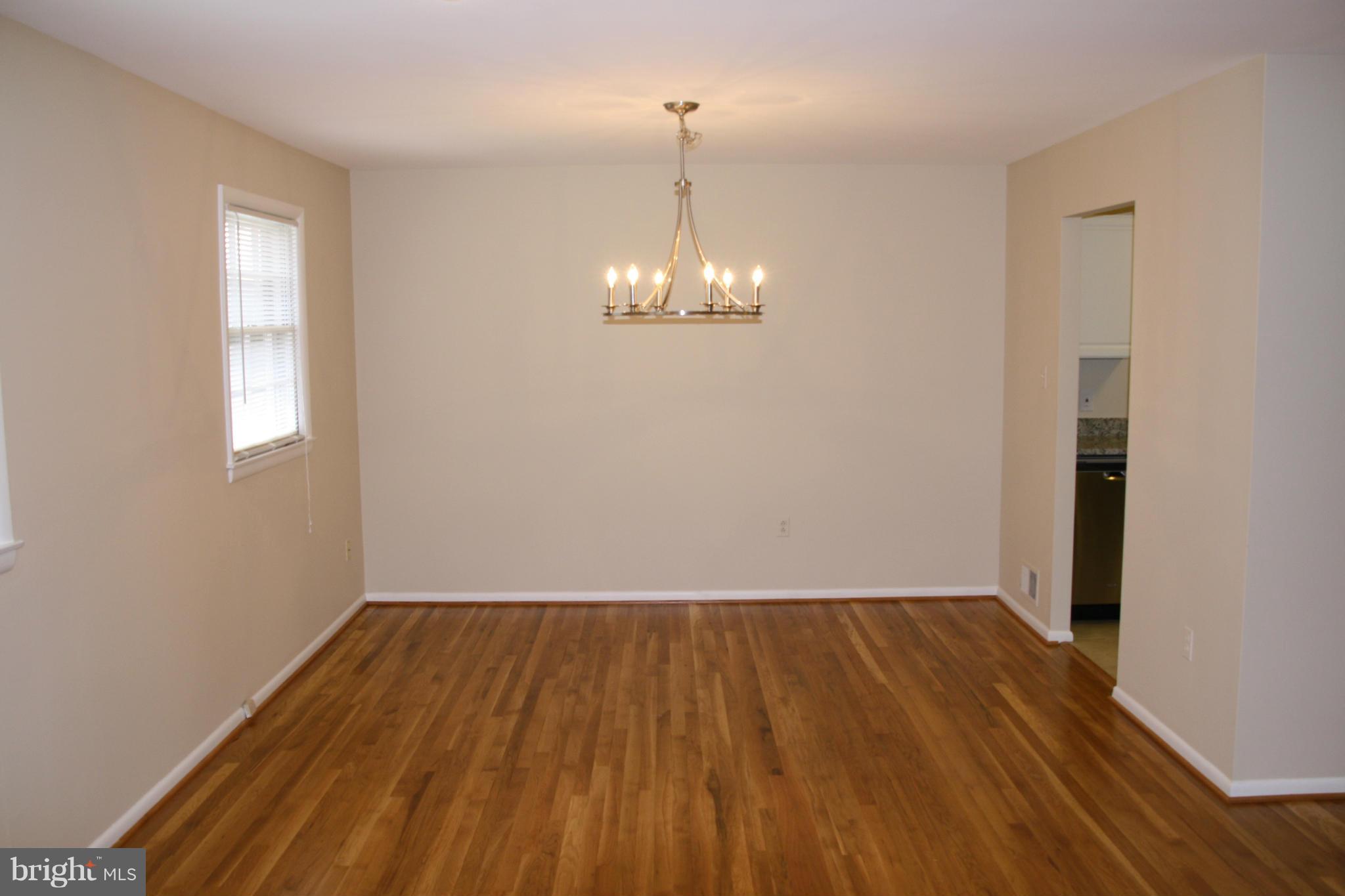 11509 Bucknell Drive Silver Spring, MD 20902 - Photo 4 of 23 Dining Room with Refinished Hardwood