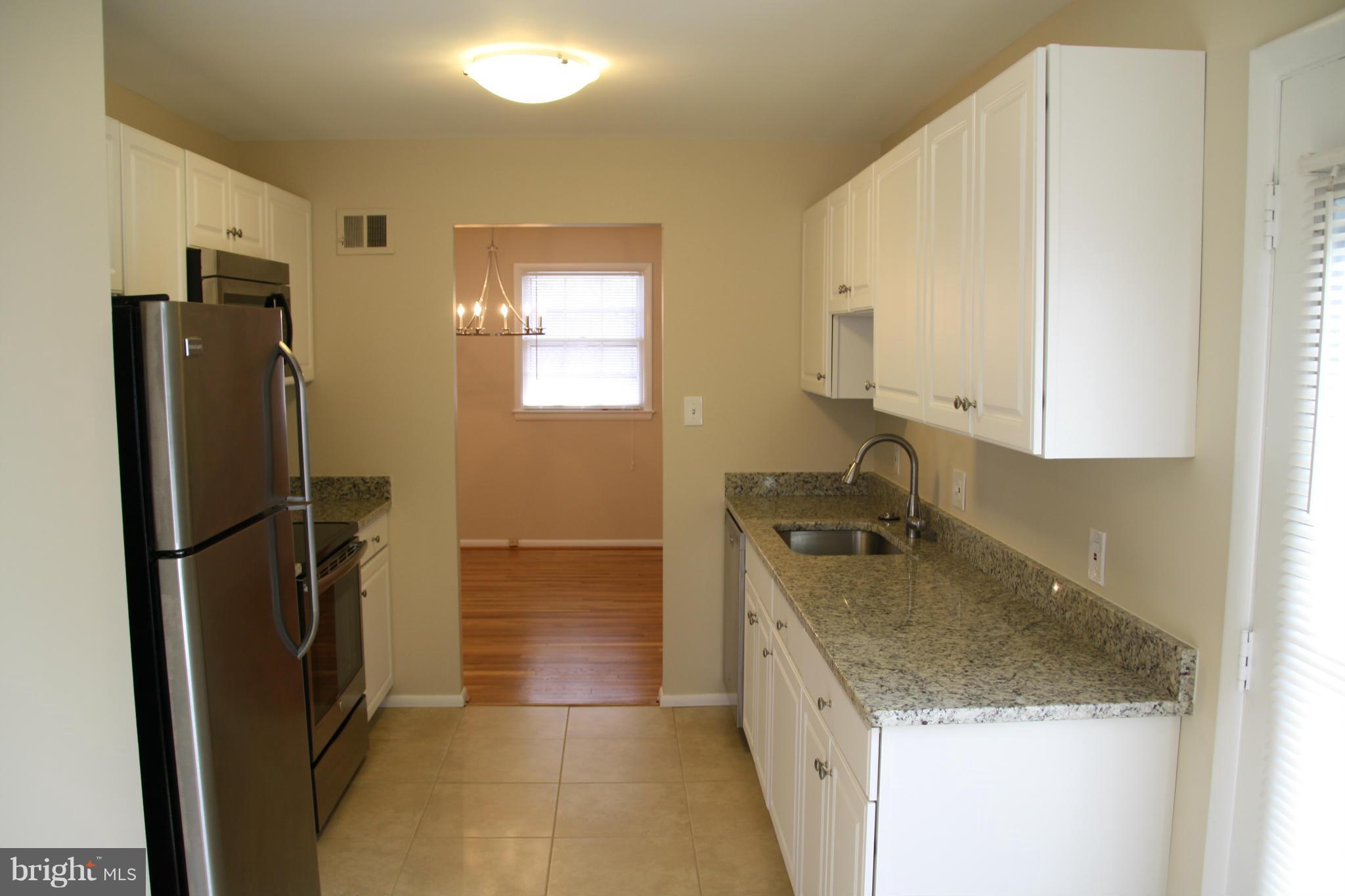 11509 Bucknell Drive Silver Spring, MD 20902 - Photo 6 of 23 Beautiful Kitchen-New Ceramic Tile
